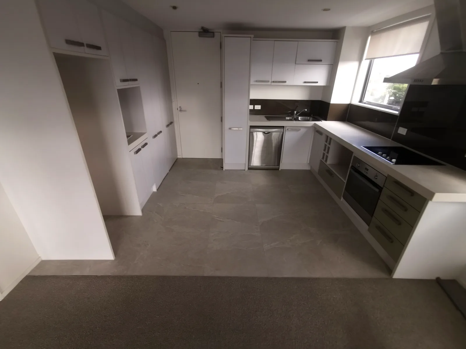 Clean white kitchen splashback tiling, Auckland
