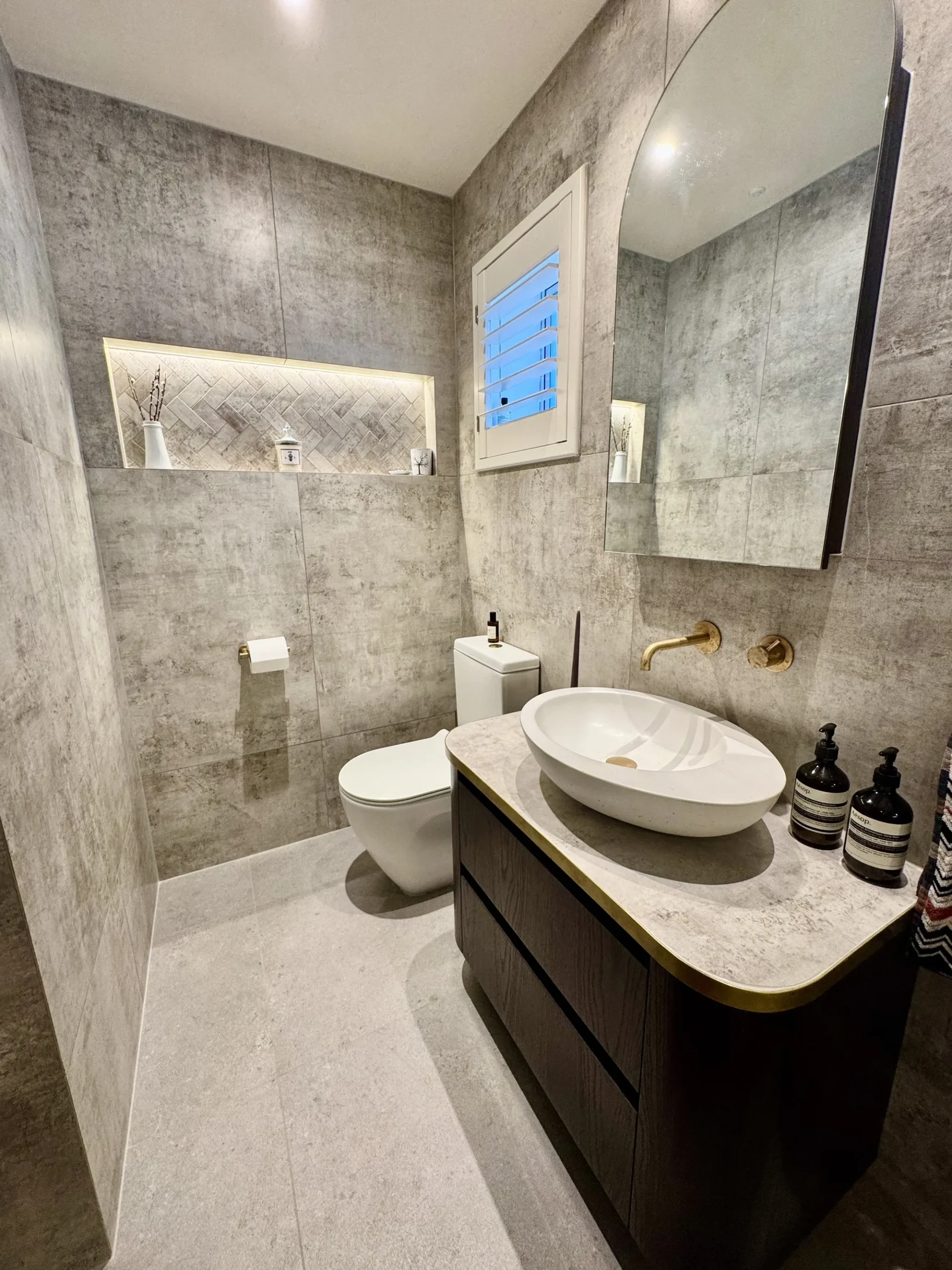 Tiled shower and feature wall in a Pt Chevalier designer bathroom, Auckland — tiling by Tarara Tiling