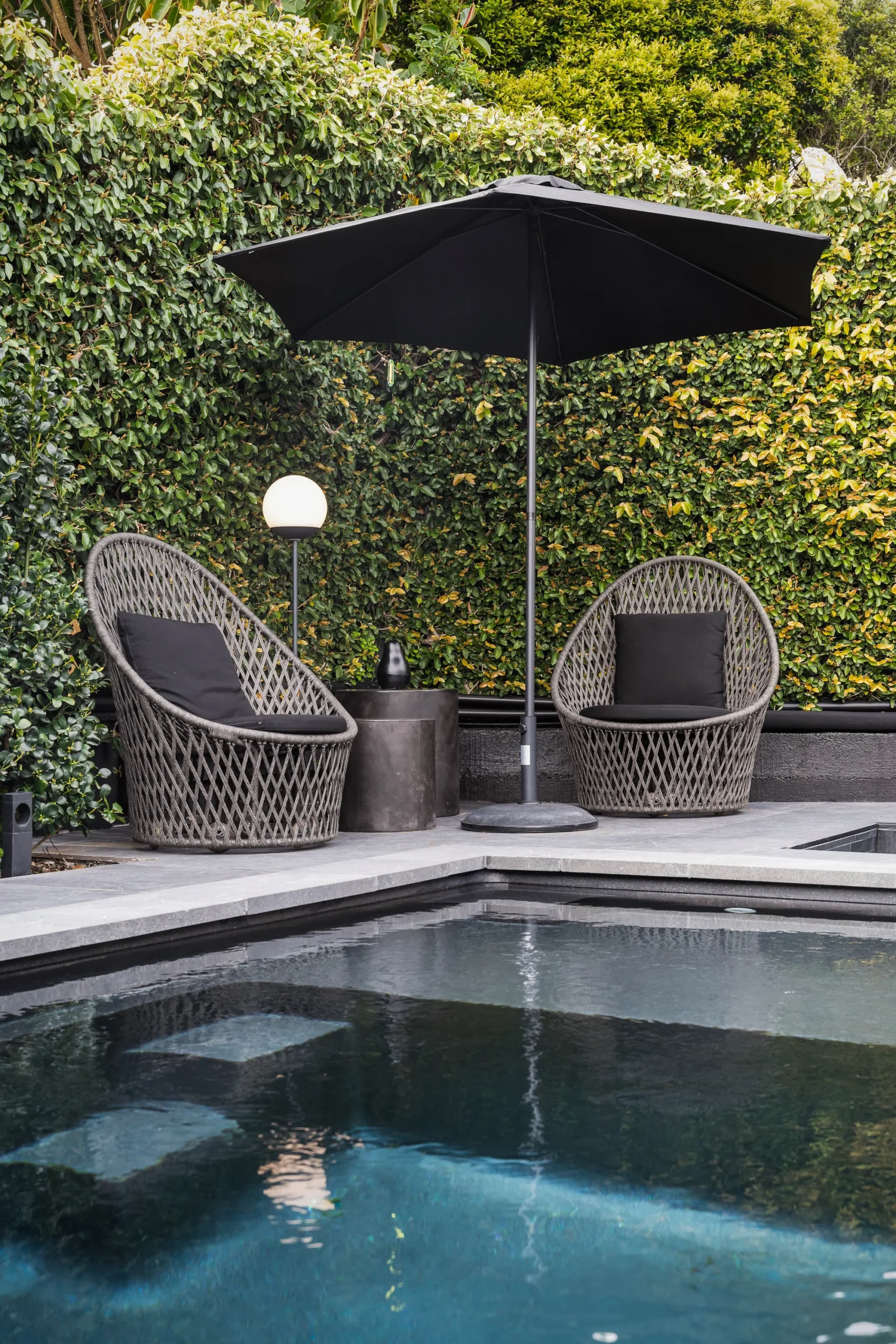 Tiled pool surround with crisp mitred edge detailing, Pt Chevalier, Auckland — tiling by Tarara Tiling