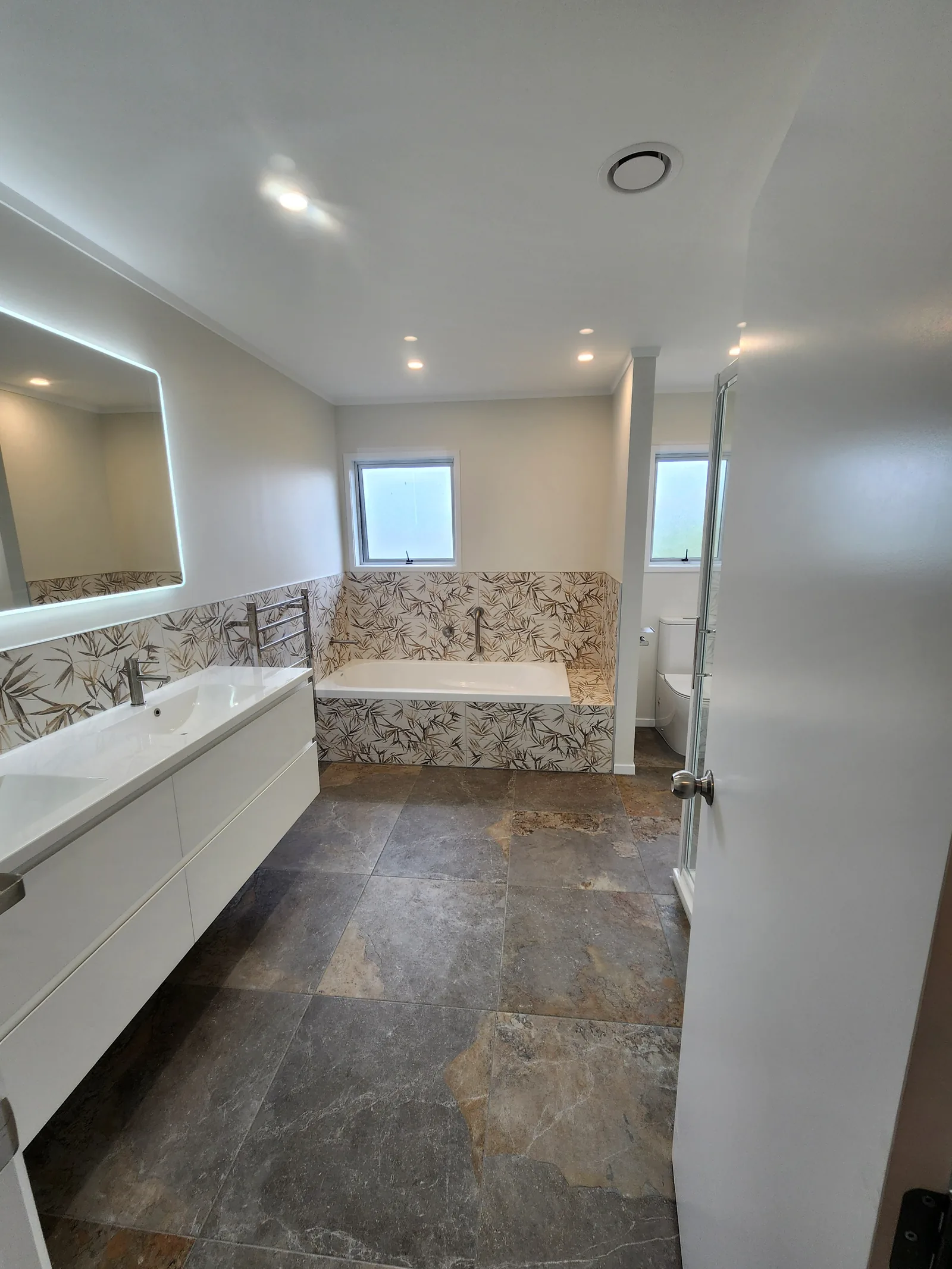 Tiled floor on a Massey development, West Auckland
